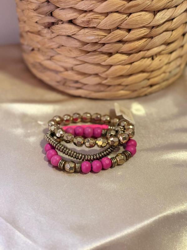 PULSERAS DORADA/FUCSIA APROJECT
