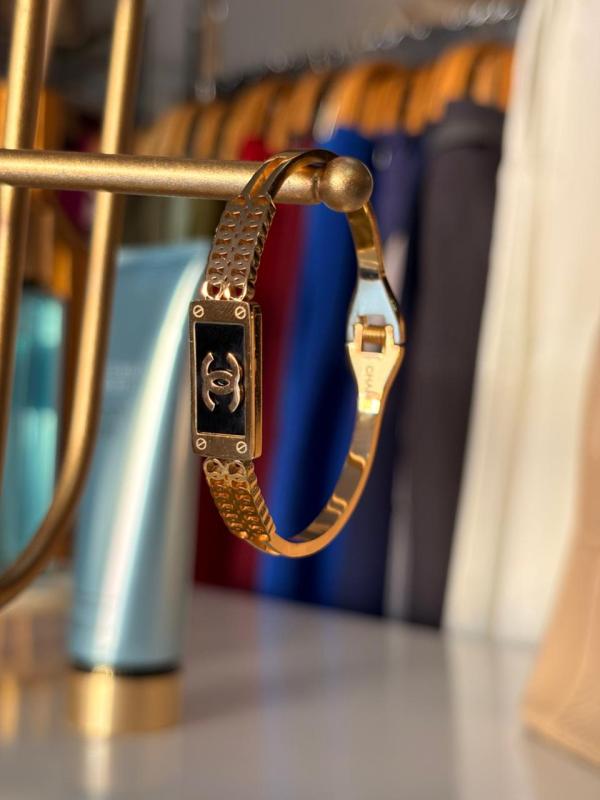 PULSERA ACERO DORADA